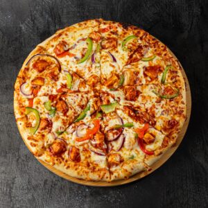 BBQ chicken pizza with BBQ sauce drizzle, peppers and red onion at Bross Slice and Grill