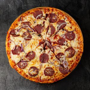 Halal beef pepperoni pizza with generous pepperoni slices at Bross Slice and Grill