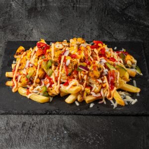 Loaded fries with grilled chicken, cheese, peppers and sauces at Bross Slice and Grill