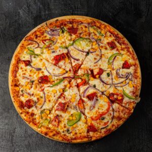 Halal chicken tikka pizza with tikka chicken, red onion and sweetcorn at Bross Slice and Grill