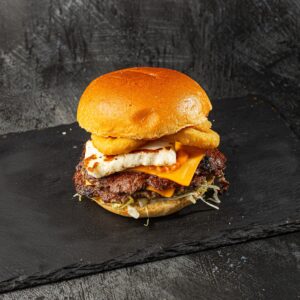 House smash burger with halloumi, onion ring and cheddar at Bross Slice and Grill