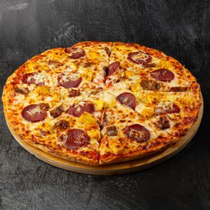 Halal meat feast pizza with pepperoni, mixed meats and peppers at Bross Slice and Grill