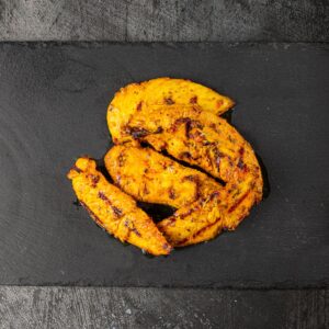 Five grilled peri peri chicken strips at Bross Slice and Grill