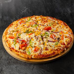 Vegetarian vege delight pizza with peppers, sweetcorn and mushrooms at Bross Slice and Grill