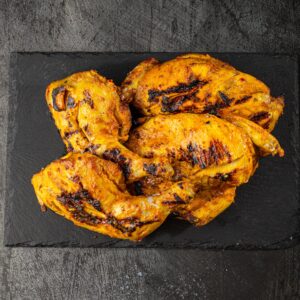 Whole butterfly grilled peri peri chicken at Bross Slice and Grill
